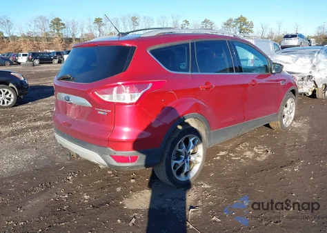 2014 Ford Escape Titanium z USA, uszkodzony, nr VIN 1FMCU9J9XEUA73116
